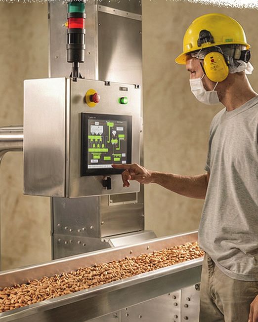 Operator at the production line control panel
